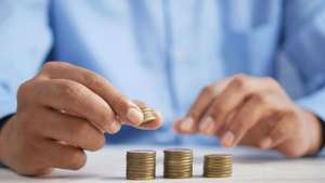 Credit Sesame Campaign 15 https app.unbouncepreview.com publish assets cdb3d0e2 36d2 4e9d 99d7 32bcd63b3bf7 20a47508 unsplash jpqyfk7gb4w a person stacking coins on top of a table jpqyfk7g 108c05k08c04p00000f01o